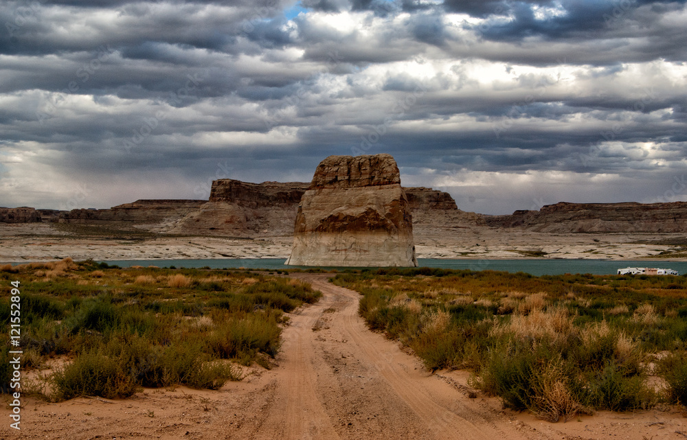 Path leading to a lonely rock in Lake Powell, Page, Arizona, USA Path leading to a lonely rock in Lake Powell, Page, Arizona, USA