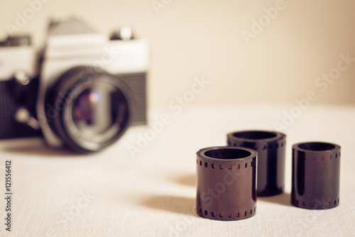 фотографія Retro photo camera with film rolls .Vintage stylized.