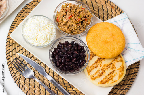 Venezuelan typical food, arepas and their different combinations. Chicken, fish, meat, cheese, black beans and pork.