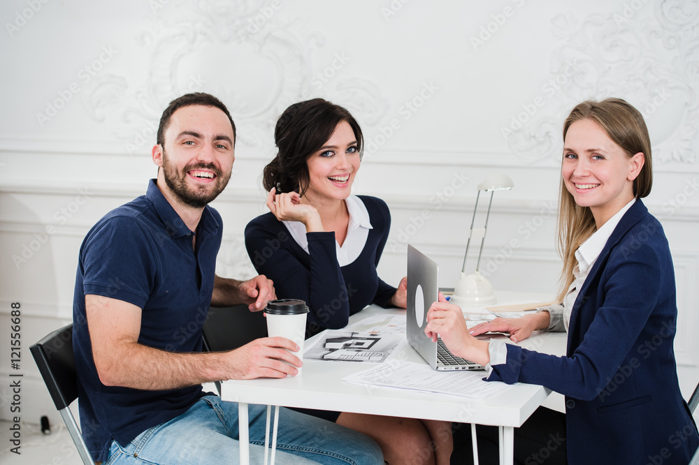 Young couple meeting architect for future house Young couple meeting architect for future house