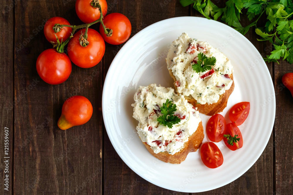 Sandwiches with pate cheese, garlic, slices of pepper, dill. Organic health food. A healthy breakfast. The top view Sandwiches with pate cheese, garlic, slices of pepper, dill. Organic health food. A healthy breakfast. The top view