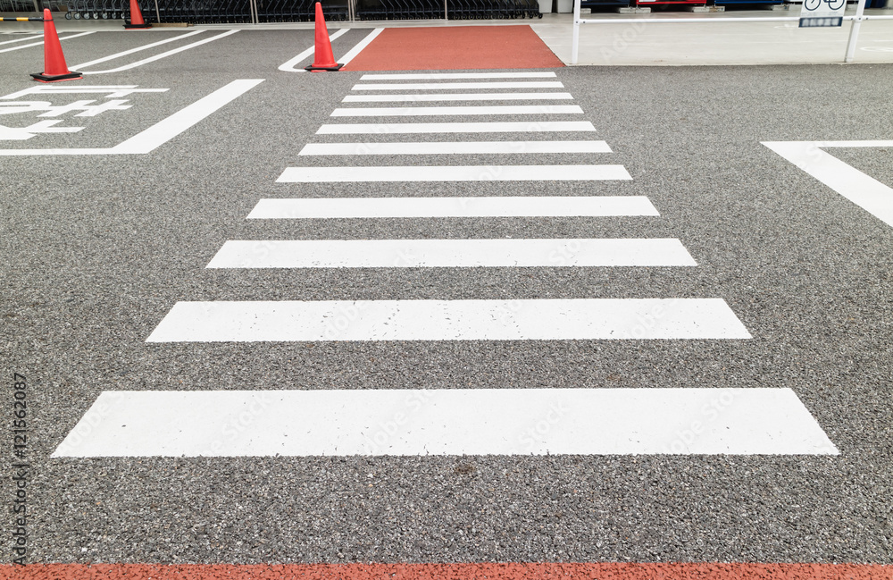 Cross walk in the city infront the store Cross walk in the city infront the store