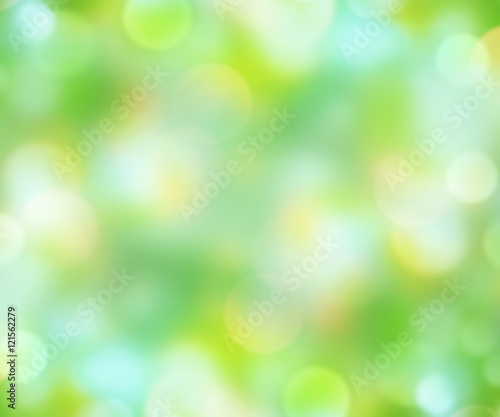 Green blur shining natural background.Easter wallpaper.