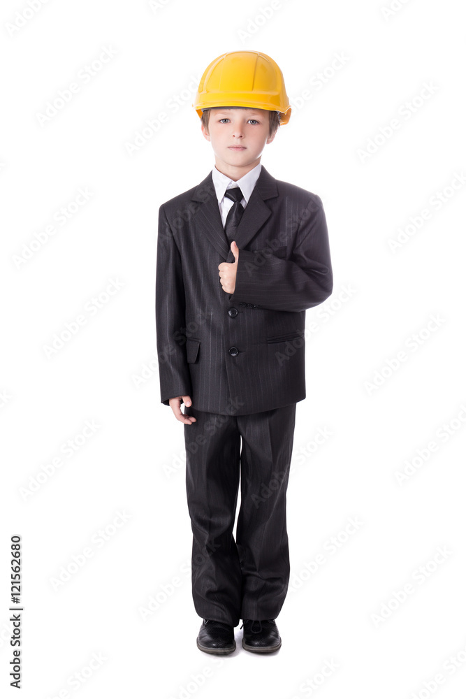 little boy in business suit and builder's helmet isolated on whi little boy in business suit and builder's helmet isolated on whi