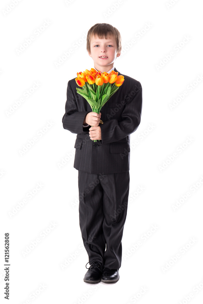full length portrait of little boy in business suit with flowers full length portrait of little boy in business suit with flowers