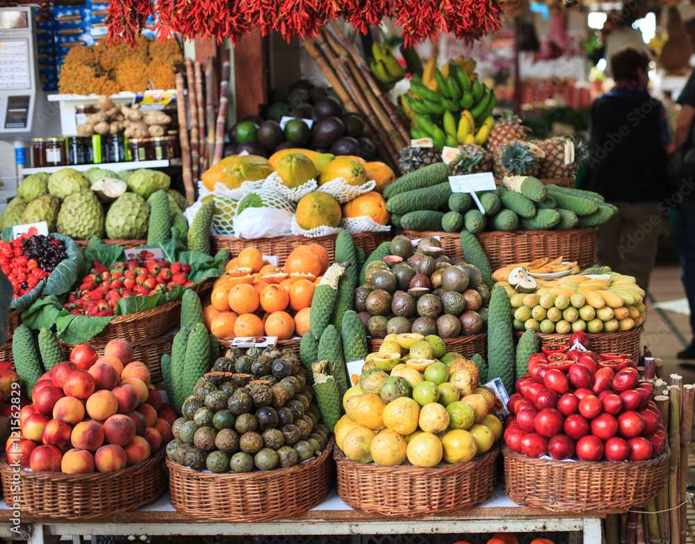 Fresh exotic fruits on famous market in Funchal (Mercado dos Lavradores), Madeira island, Portugal
