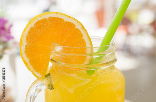 Orange slice on glass