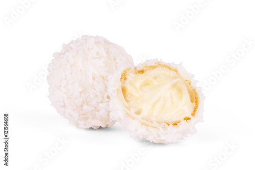 White Chocolate Candy With Coconut Topping On White Background photo