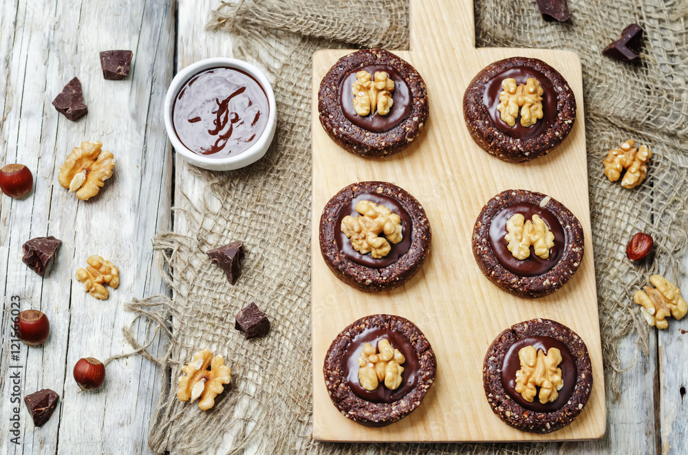 Raw vegan chocolate dates hazelnut cookies with chocolate frosti Raw vegan chocolate dates hazelnut cookies with chocolate frosti