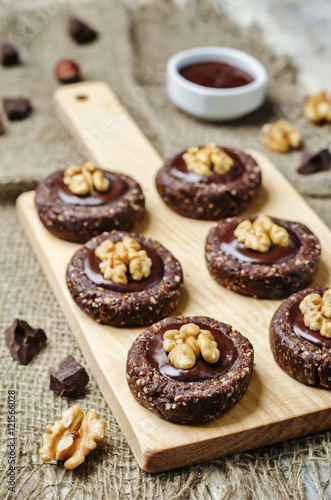 Raw vegan chocolate dates hazelnut cookies with chocolate frosti