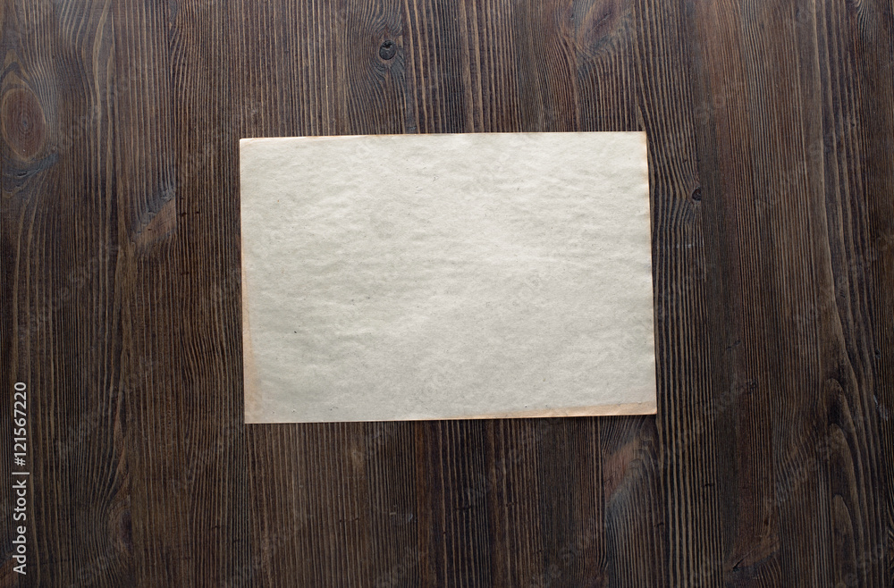 paper on wooden background paper on wooden background
