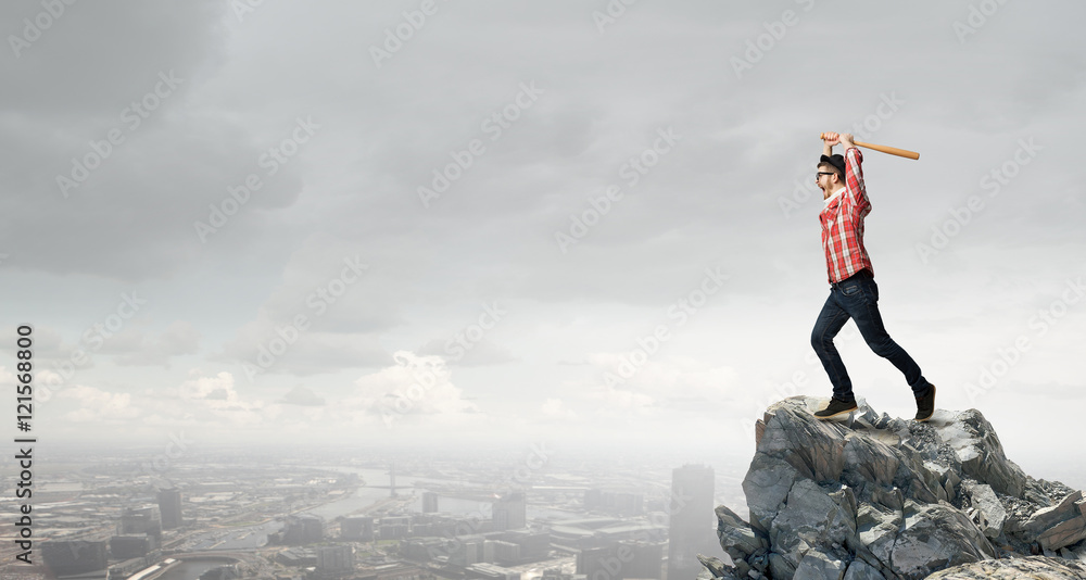 Hipster guy with bat . Mixed media