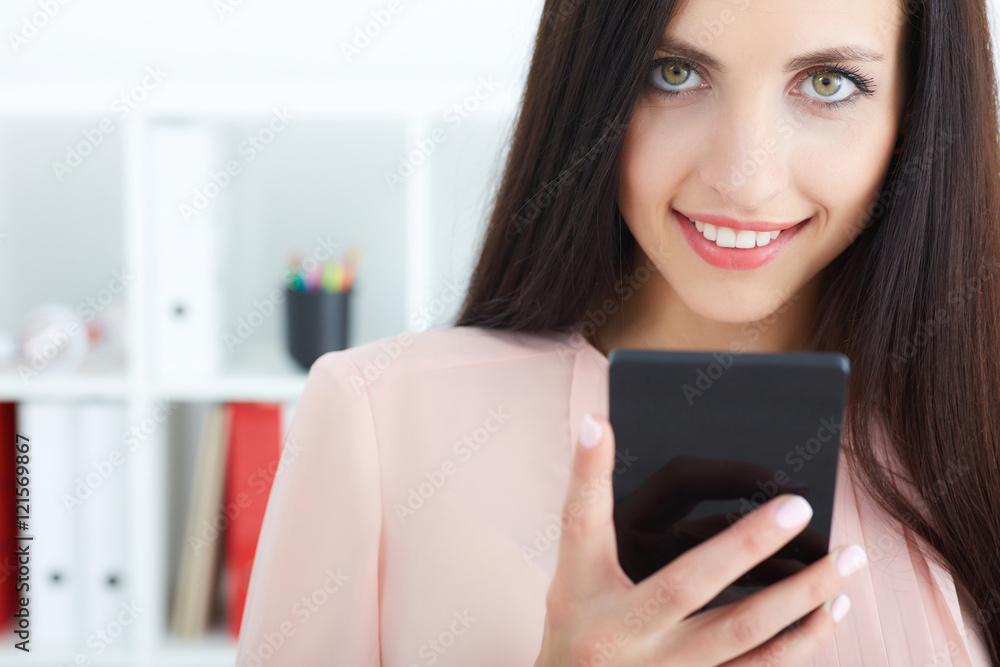 Portrait of a beautiful woman using a cell phone Portrait of a beautiful woman using a cell phone