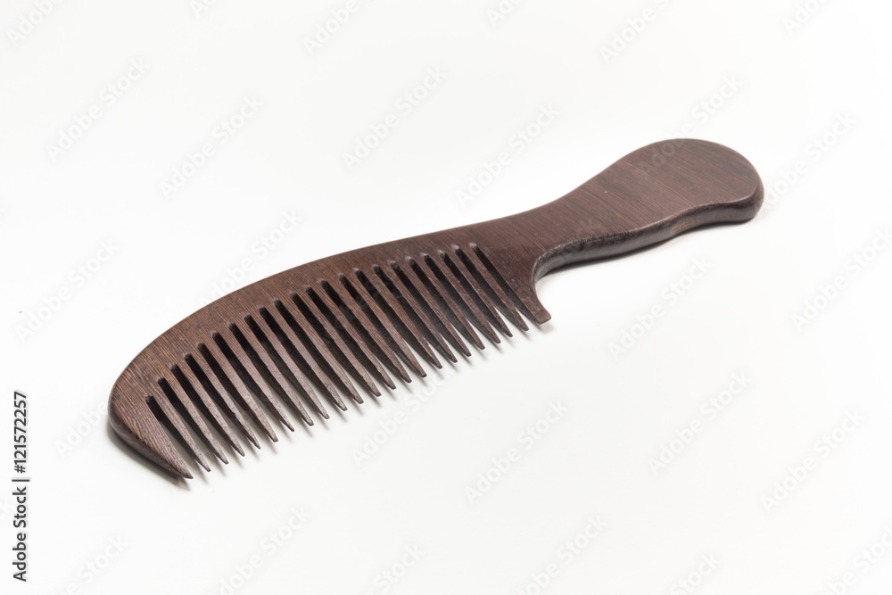 wooden comb On a white background wooden comb On a white background