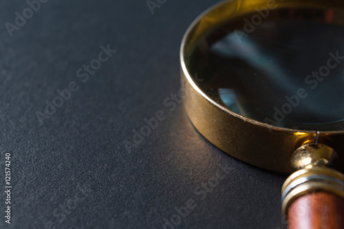 Selective focus a picture of magnifier for your design idea and background