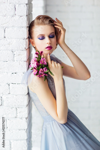 Beautiful young girl with a wedding bouquet © Natalia Chircova