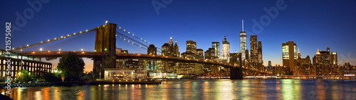 Brooklyn Bridge panorama with Manhattan skyline at dusk  New York