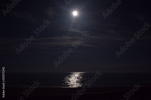 Fotografie, Obraz Ocean Beneath the Moonlit Sky