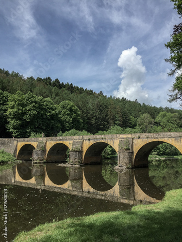 Reflexion of a bridge over a river in Ardennes, Belgium  © SörenSeels