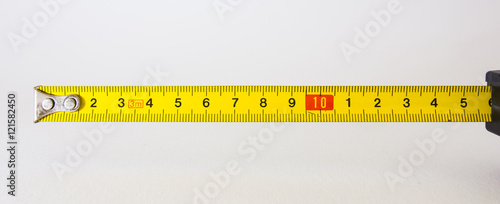 Tape Measure Rolled Out Yellow Bright Lines Closeup Construction