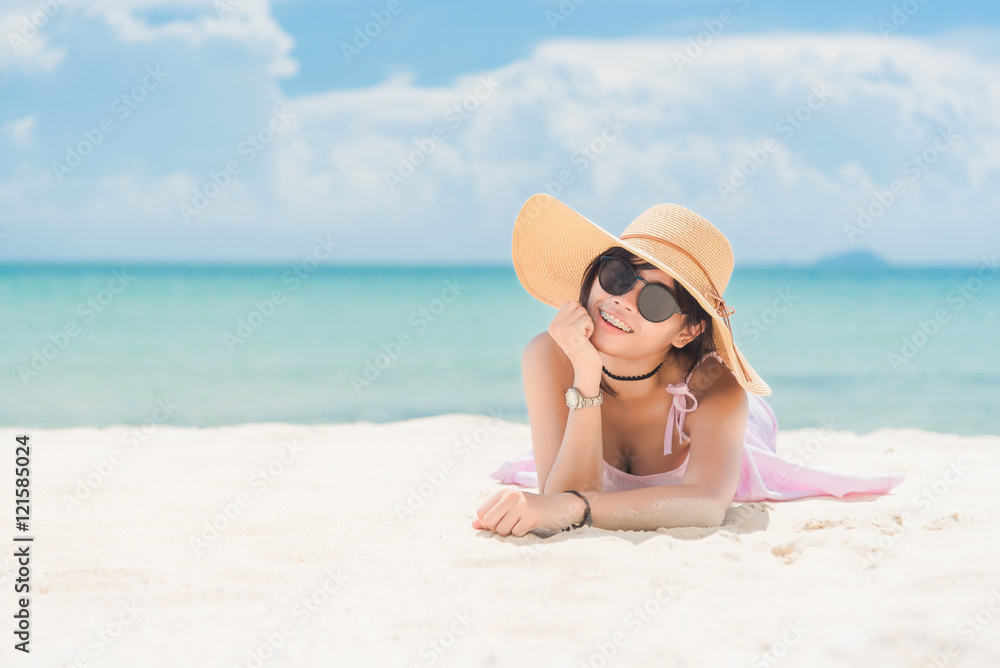 Asian girl at the beach. Girls wearing glasses lying on the beach. Woman at sea from Thailand. Vivid tone.
Asian girl at the beach. Girls wearing glasses lying on the beach. Woman at sea from Thailand. Vivid tone.