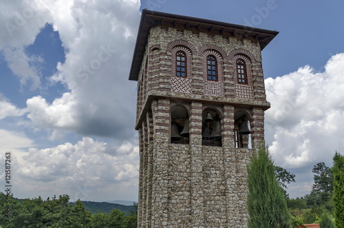 View of inner part yard with bell tower in restored Montenegrin or Giginski monastery St. St. Cosmas and Damian, mountain Kitka, Breznik, Pernik region, Bulgaria