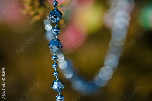 Blue Beads Strung on the Outdoor Christmas Tree