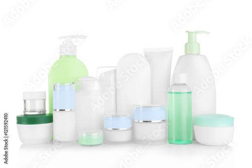 Different cosmetic bottles isolated on white