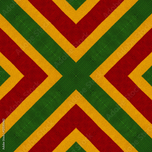 Reggae colors crochet knitted style background, top view. Collage with mirror reflection. Seamless kaleidoscope montage for cushion, blanket, pillow, plaid, tablecloth, cloth