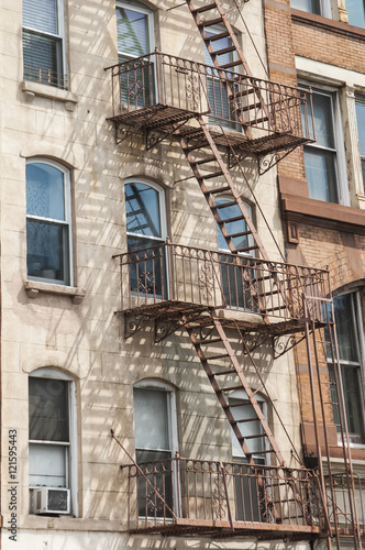External fire escape staircase on old brick building