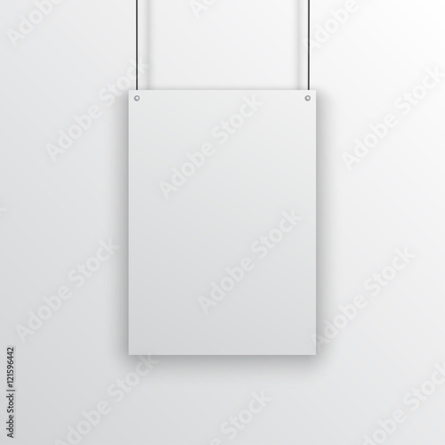 Blank white poster mockup hanging on the white wall