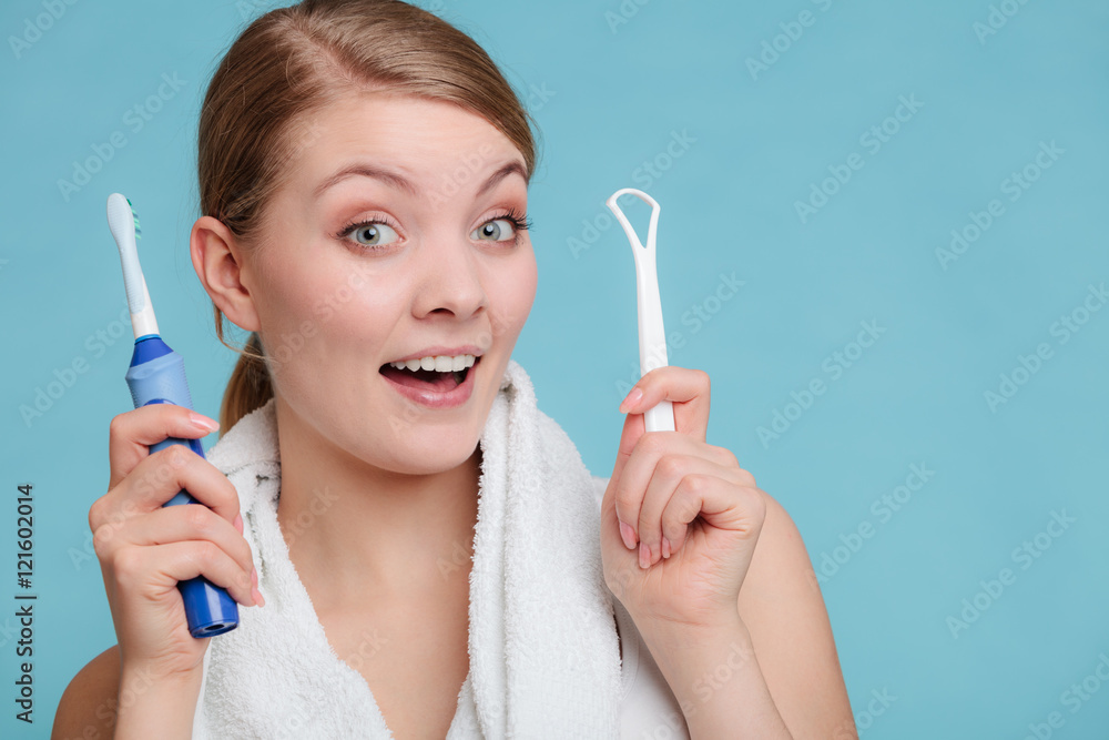 Girl with brush and tongue cleaner. Girl with brush and tongue cleaner.
