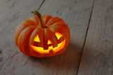 Jack o' lantern, halloween, pumpkins on wooden background