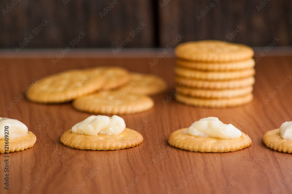 crackers biscuits on wooden background crackers biscuits on wooden background