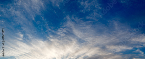 Clouds on background blue sky.