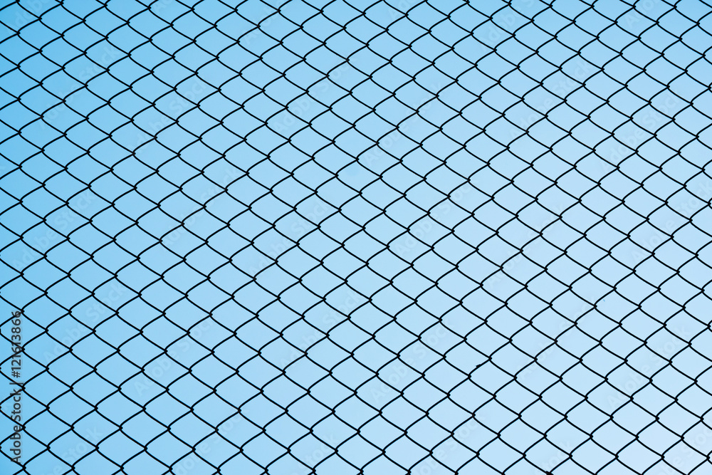 Silhouette steel net wire against gradient clear blue sky Silhouette steel net wire against gradient clear blue sky