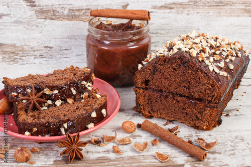 Принти на полотні Gingerbread or dark cake with chocolate, cocoa and plum jam, delicious dessert