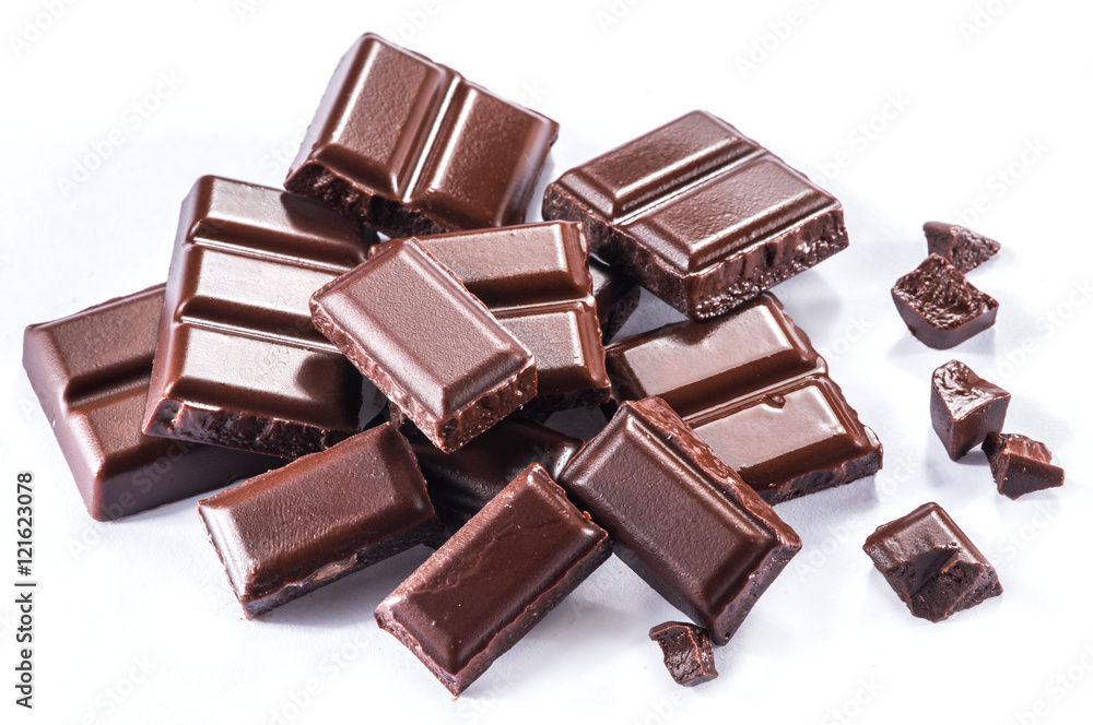 Pieces of chocolate bar isolated on a white background. Pieces of chocolate bar isolated on a white background.