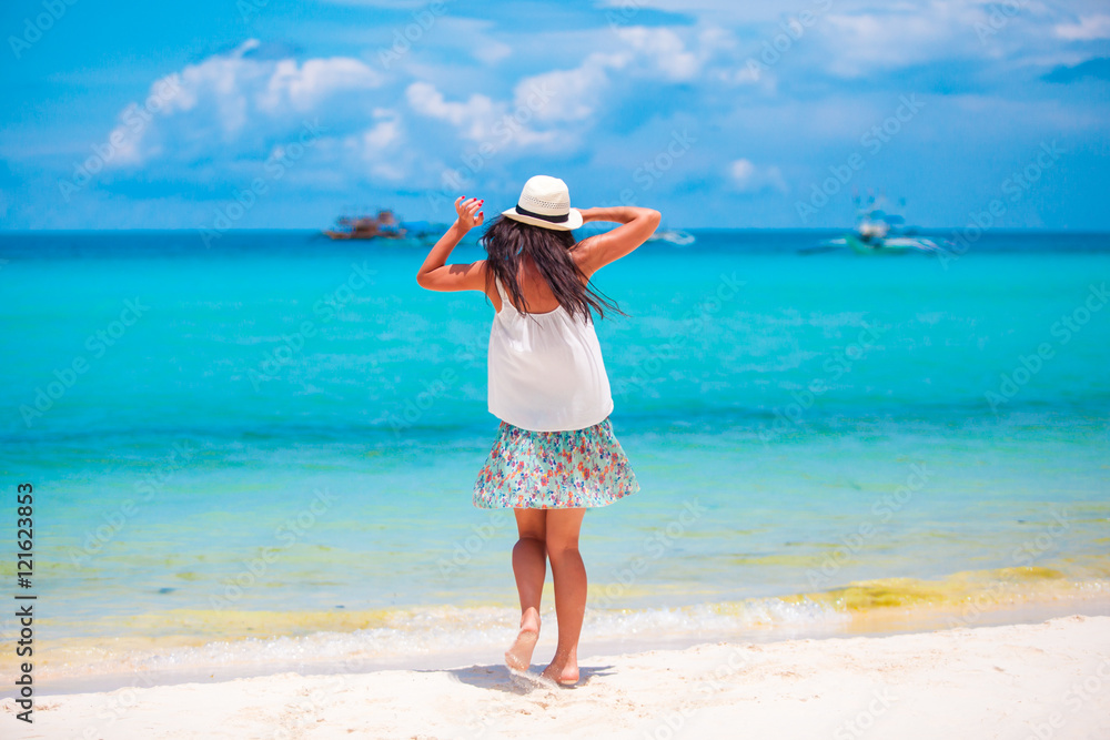 Happy beautiful girl enjoying beach tropical vacation Happy beautiful girl enjoying beach tropical vacation
