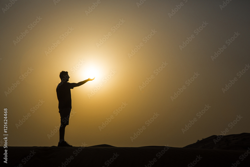 man holding a sun man holding a sun