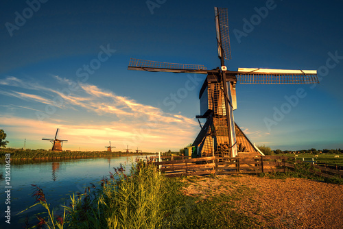 Photography Sunrise facing the Kinderdijk windmill, the UNESCO world heritage monuments in A