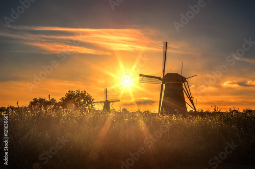 Beautiful sunset over Kinderdijk windmill, Unesco world heritage monument, Alblasserdam, Netherlands