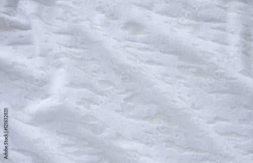 светлая хлопковая ткань текстура. белая бежевая натуральная ткань складки