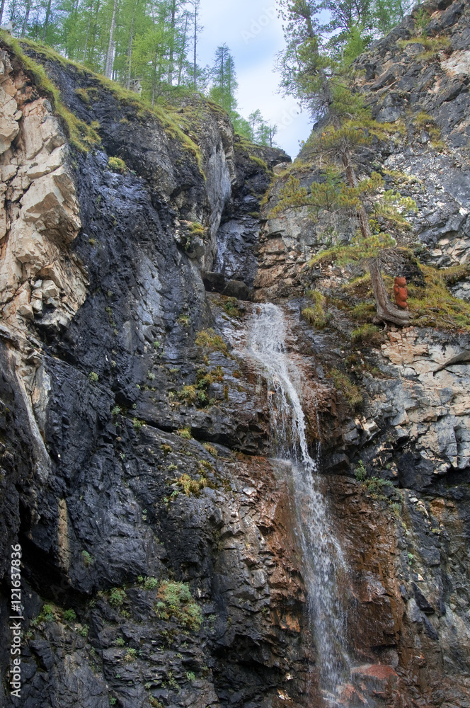 Waterfall in the jungle of the Dominican Republic. Samana Peninsula. photo toned.