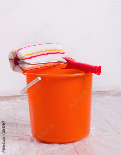Roller brush and bucket for wall painting