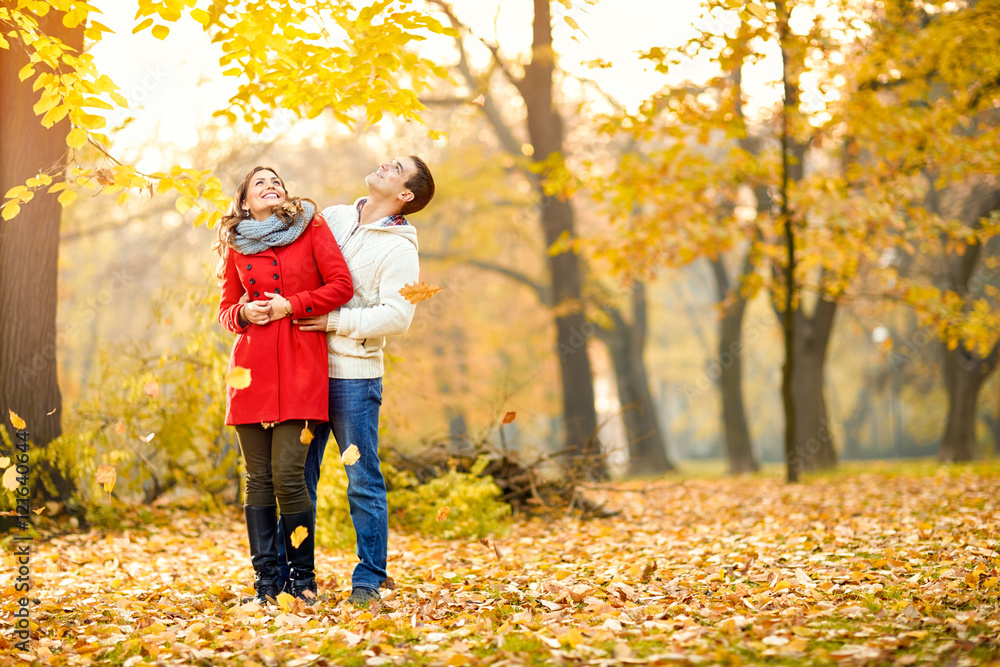 Couple in love hugging in park Couple in love hugging in park
