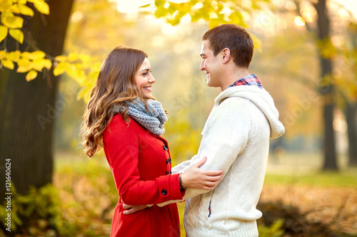 Women and man in love in park