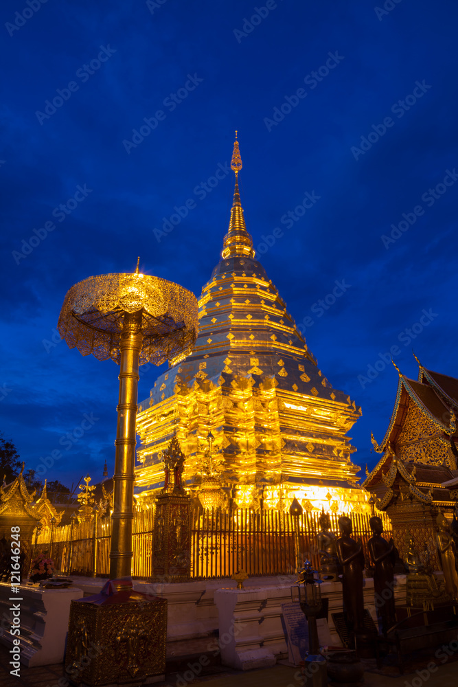 golden pagoda in twilight of wat phra that doi suthep . The most
