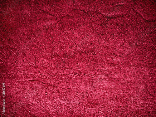 Solid red wall as backgroun...