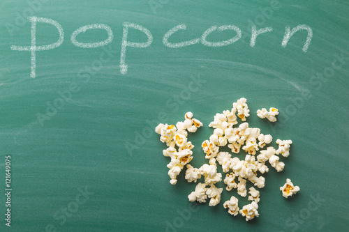 Popcorn on green chalkboard.